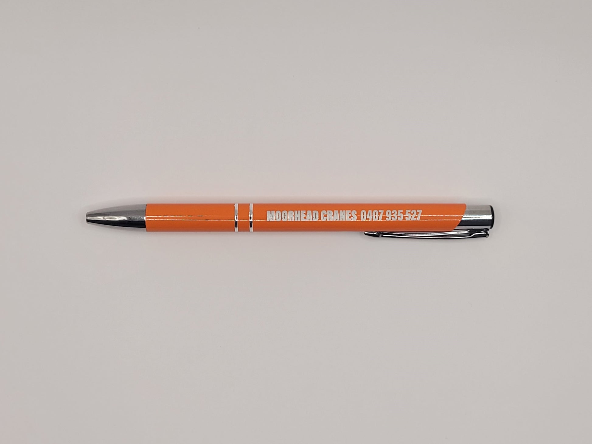 Client give-away,  Logo on stylish pen, orange