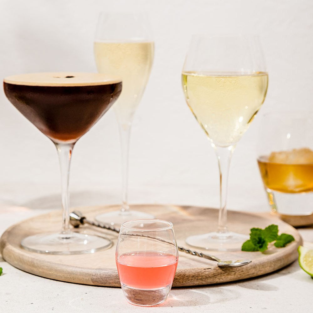 Three different sizes of white wine glasses are available for businesses to add their branding to